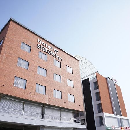 Hotel Stature Inn Kevadia Bagian luar foto