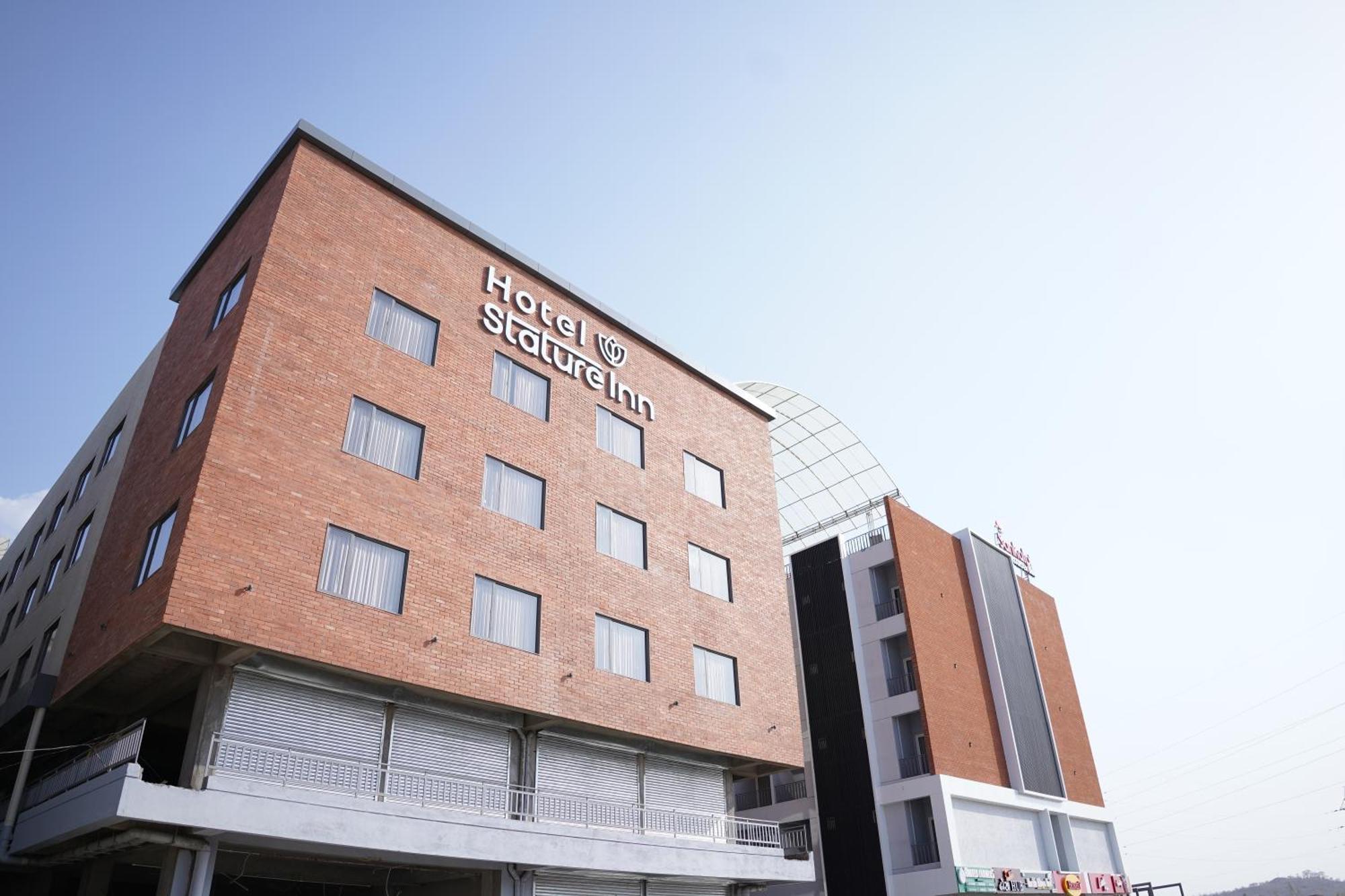 Hotel Stature Inn Kevadia Bagian luar foto